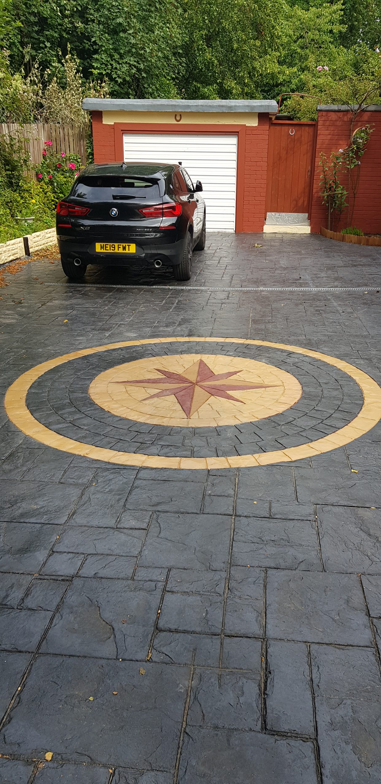 Patterned Star poured concrete driveway